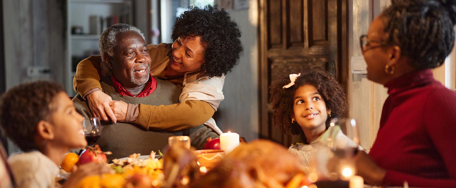 Family enjoying Thanksgiving dinner