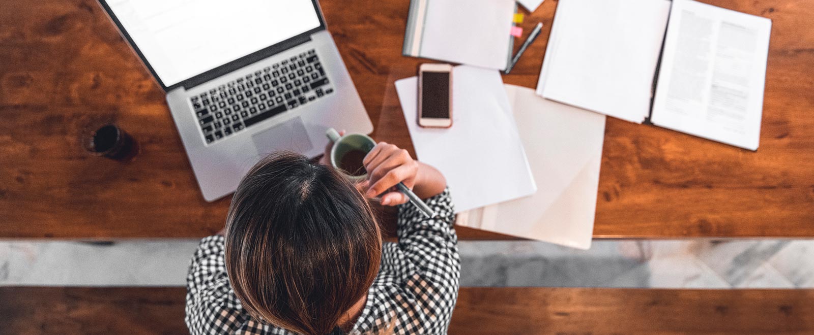 Woman going over finances in home office